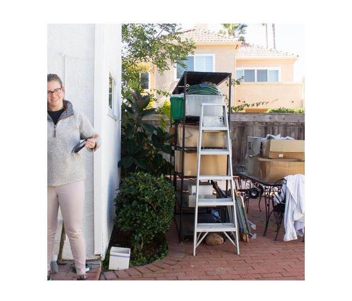 Office shelves and belongings outside of a building. 