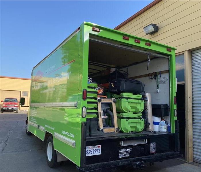 Water repair equipment loaded into truck. 