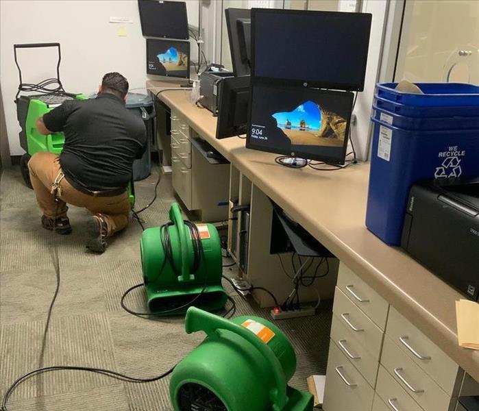 Air movers in commercial building. 