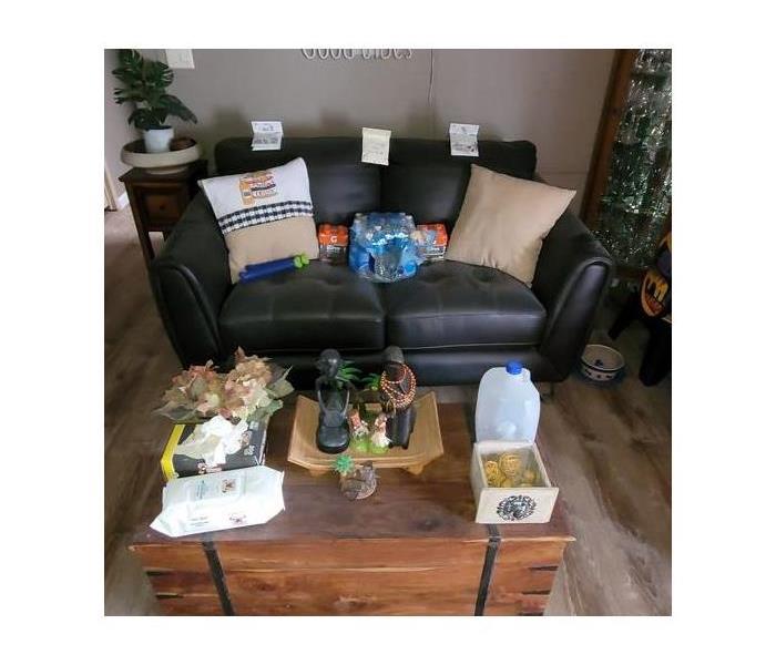 Living room furniture covered in soot.