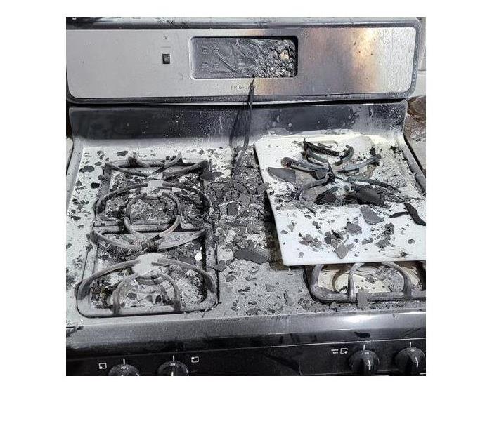 Stovetop destroyed from fire.
