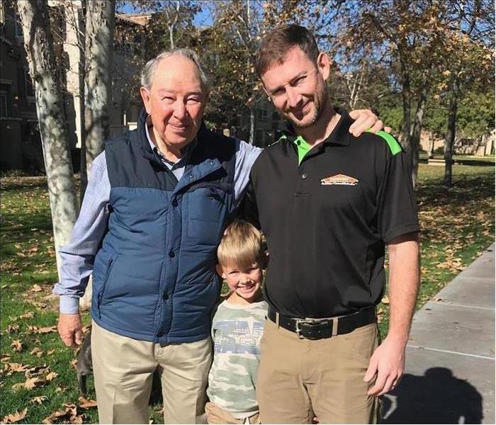 SERVPRO of Mid-City San Diego owner posing photo with son and father