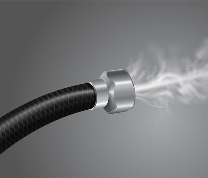 Gas coming out of a black hose, gray background